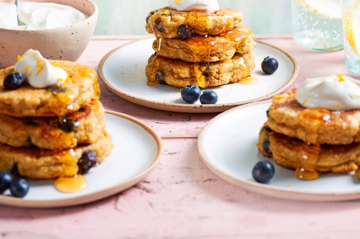 Three stacks of blueberry pancakes