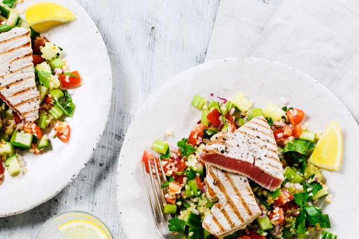 Tuna Steak with Bulgur Wheat Salad on Two Plates