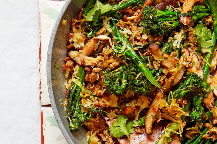 Fried Rice with Broccoli and Mushrooms in a Wok